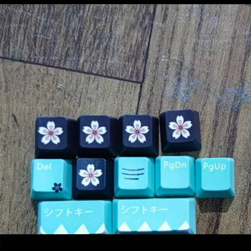 Set of green replacement keycaps for a Cherry mechanical keyboard with wireless USB receiver.
