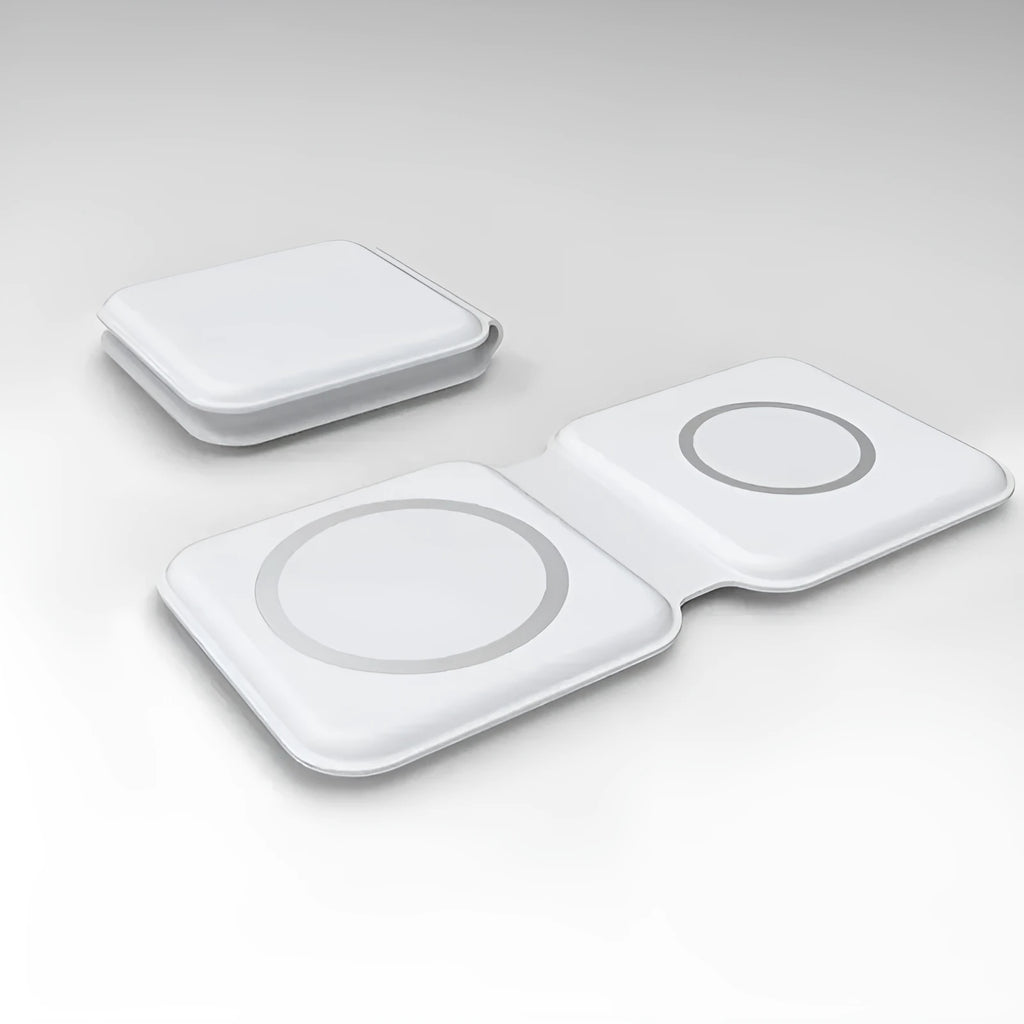 White foldable dual-pad magnetic wireless charging dock shown at an angle on a table.
