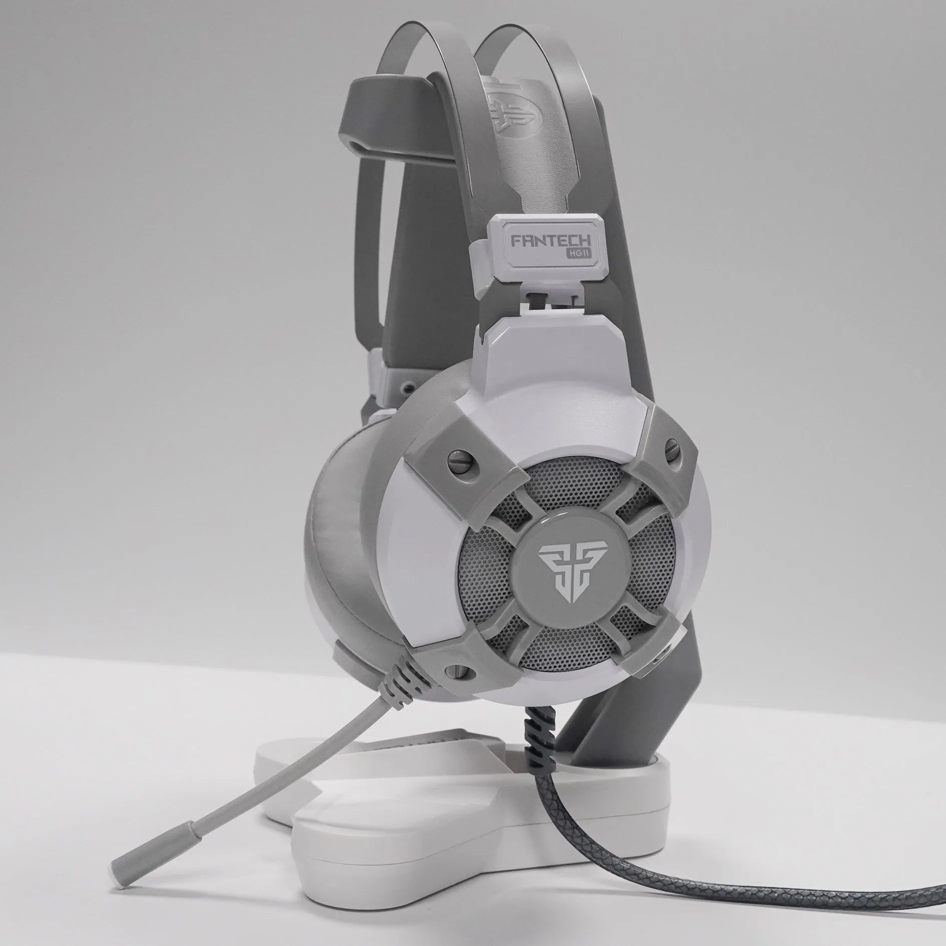 FANTECH HG11 black USB gaming headset with RGB lights showing microphone and 7.1 surround sound branding