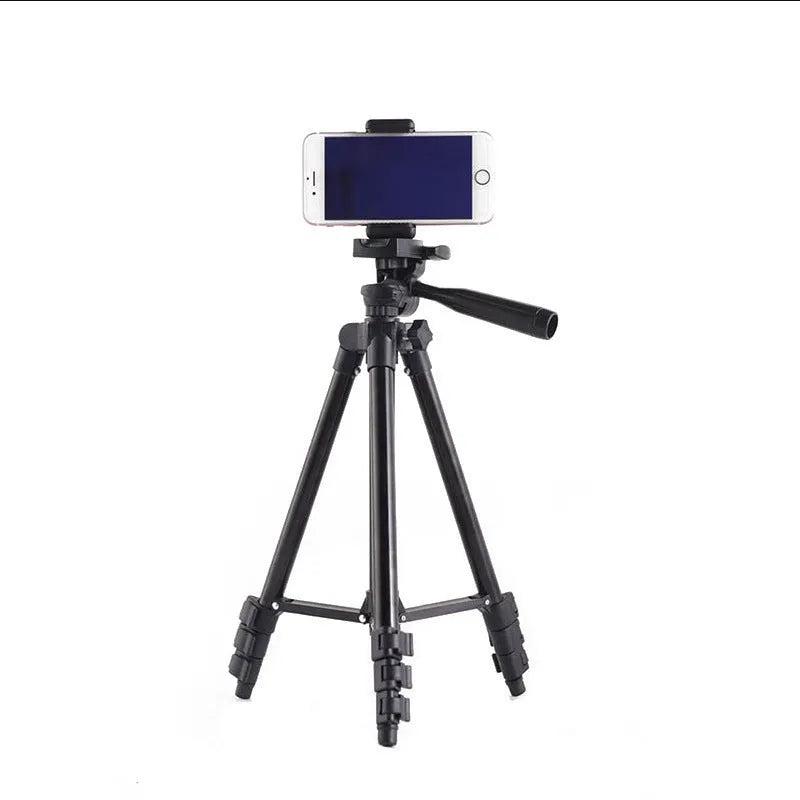 Black aluminium alloy portable camera tripod with 3D head and quick release plate extended to full height.