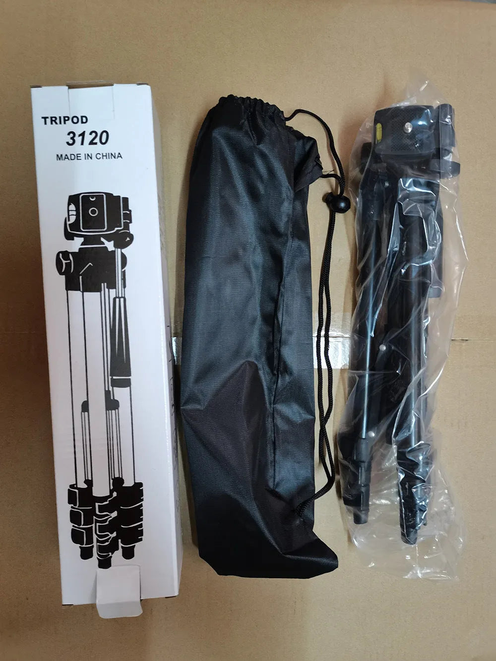 Black aluminium alloy portable camera tripod with 3D head and quick release plate extended to full height.