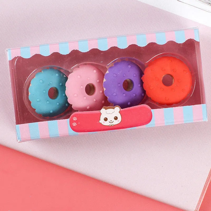 Set of 12 cartoon food erasers including ice creams, donuts, and lollipops for children.