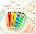 Blue plastic syringe-shaped ballpoint pen measuring 12.5cm with push-type mechanism