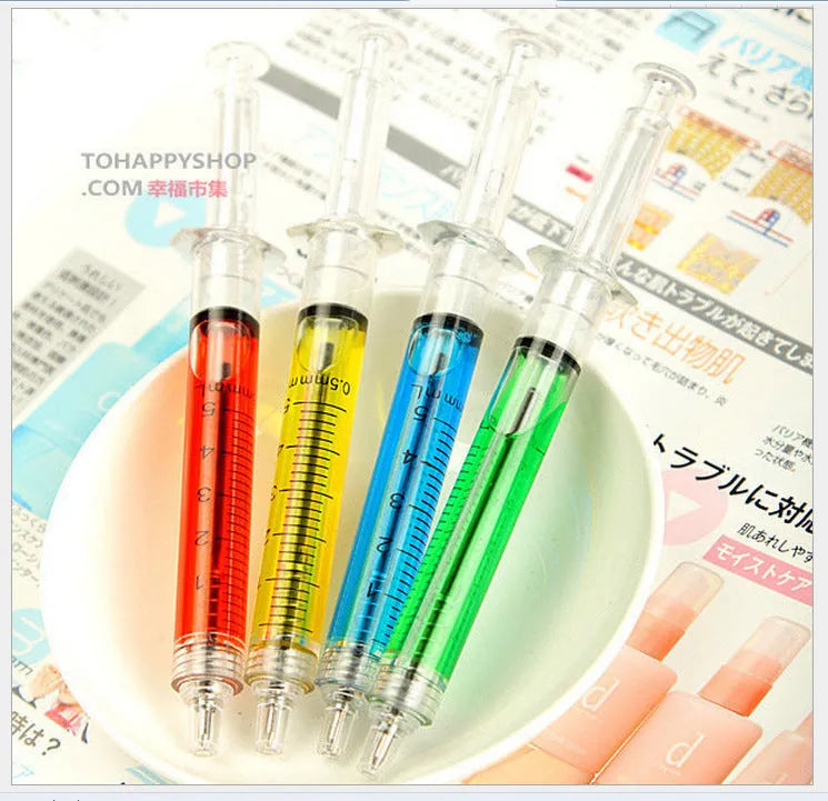 Blue plastic syringe-shaped ballpoint pen measuring 12.5cm with push-type mechanism