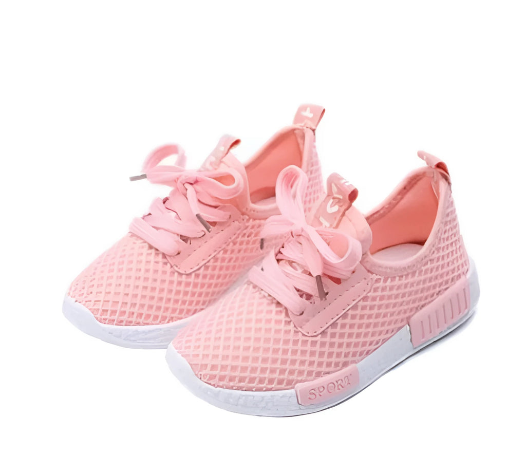 Mesh girls primary school sneakers in white with front tie laces and rubber sole