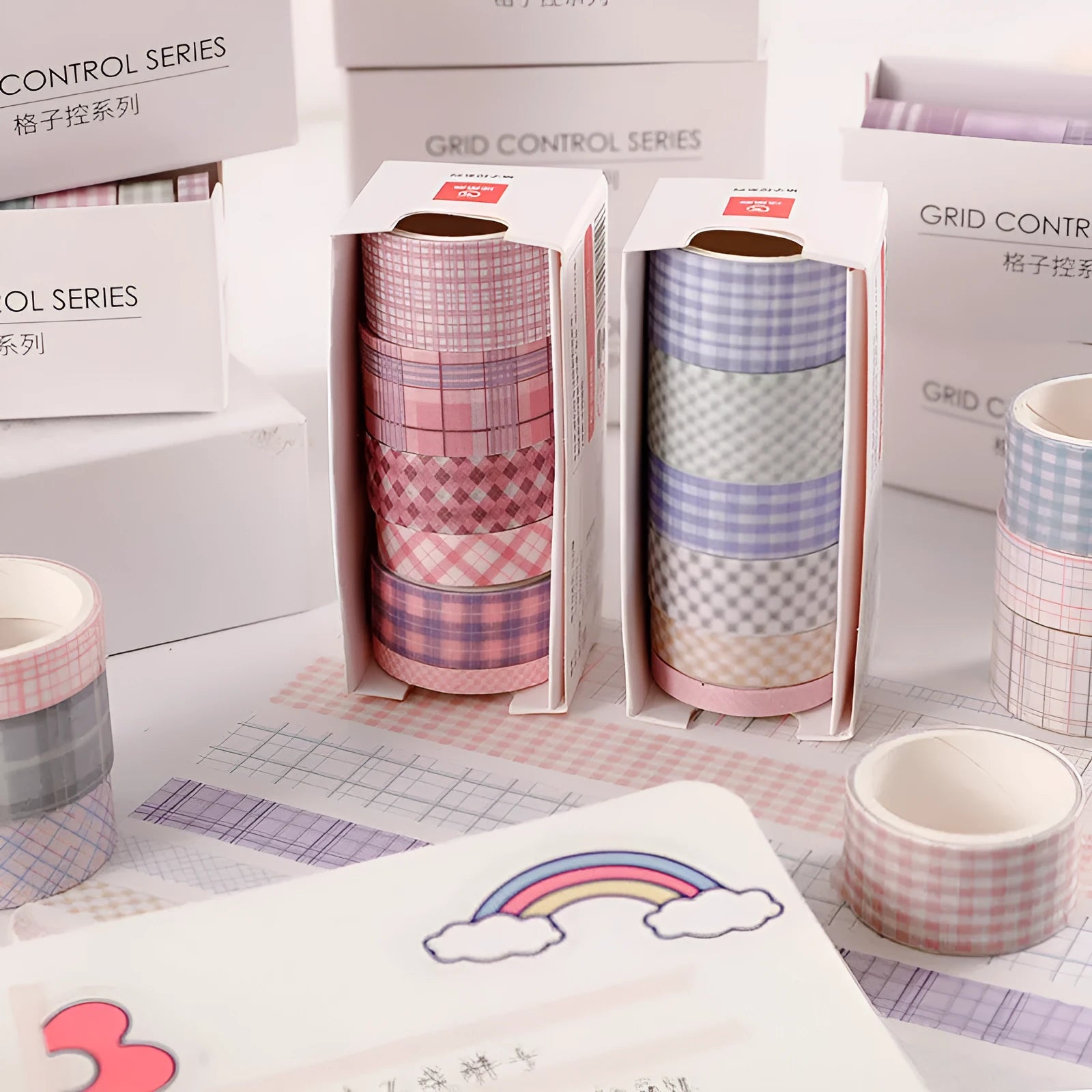 Six rolls of decorative washi tape in various widths featuring colourful retro plaid patterns on Japanese paper.