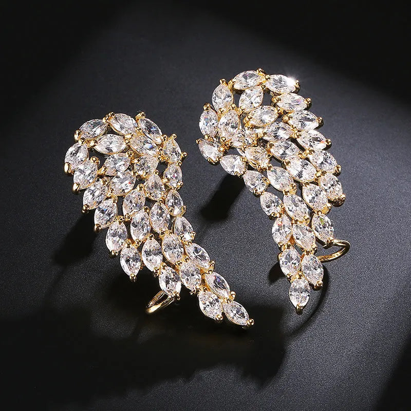 AAA cubic zirconia angel wing stud earrings in white gold colour with geometric design