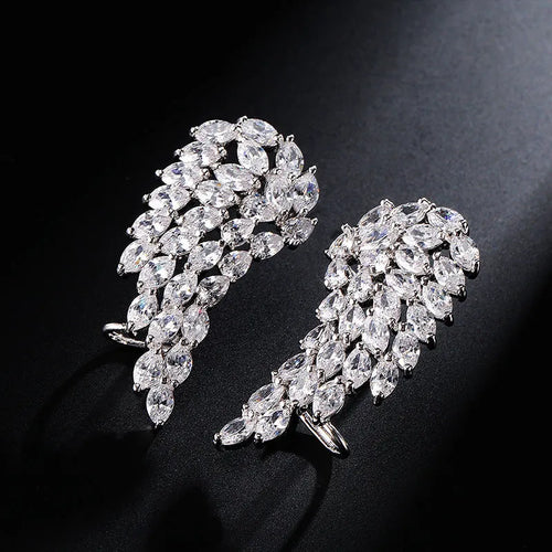 AAA cubic zirconia angel wing stud earrings in white gold colour with geometric design