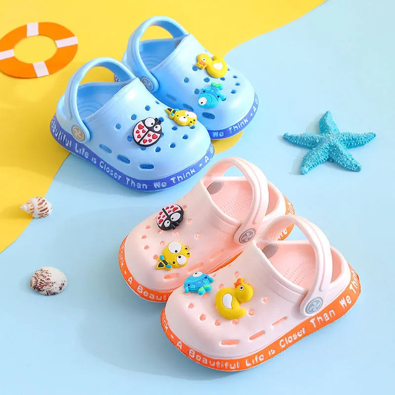 PVC toddler slippers with cartoon animal prints in yellow, blue, pink colours