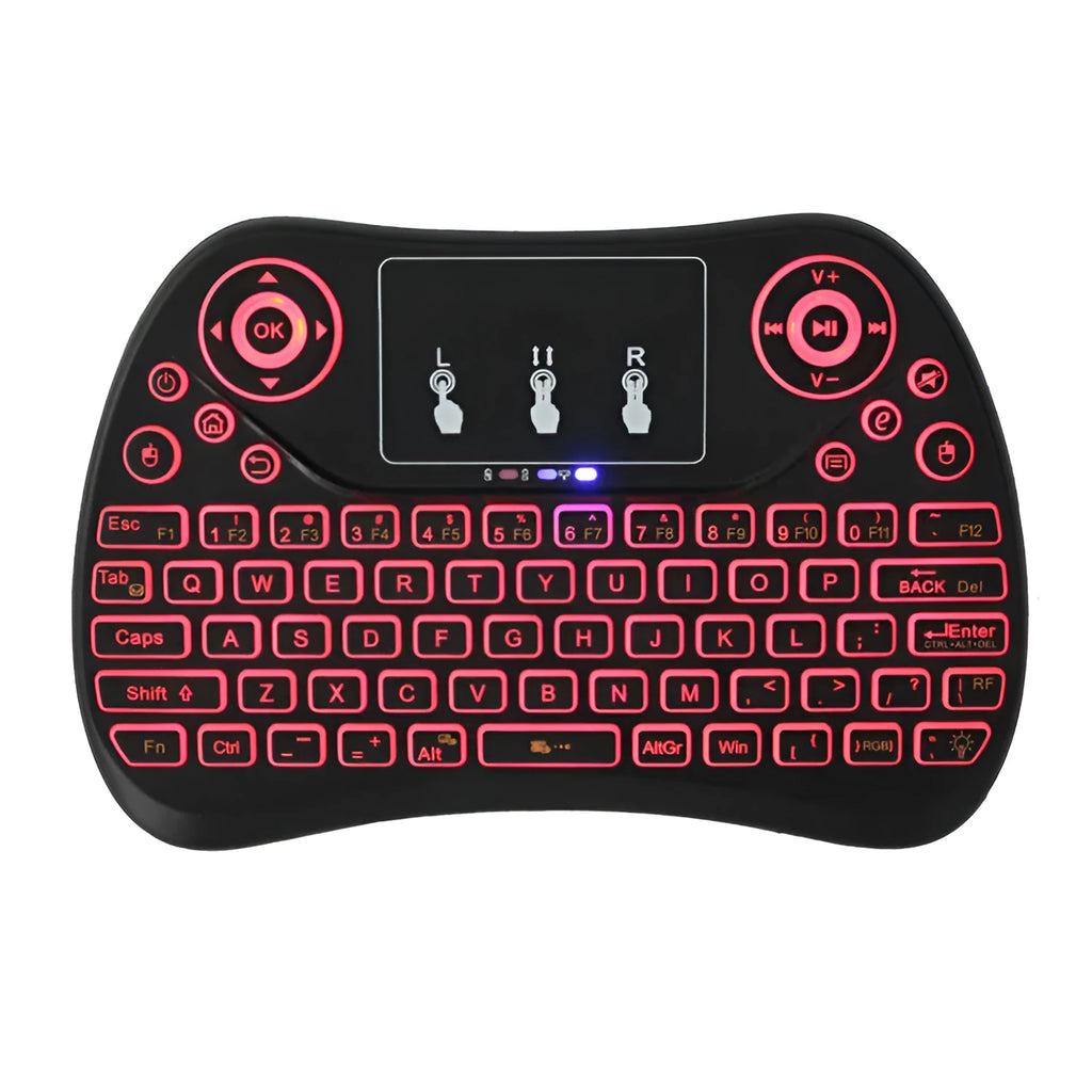 White mini wireless keyboard with colourful backlit keys and included flying squirrel mouse on a desk