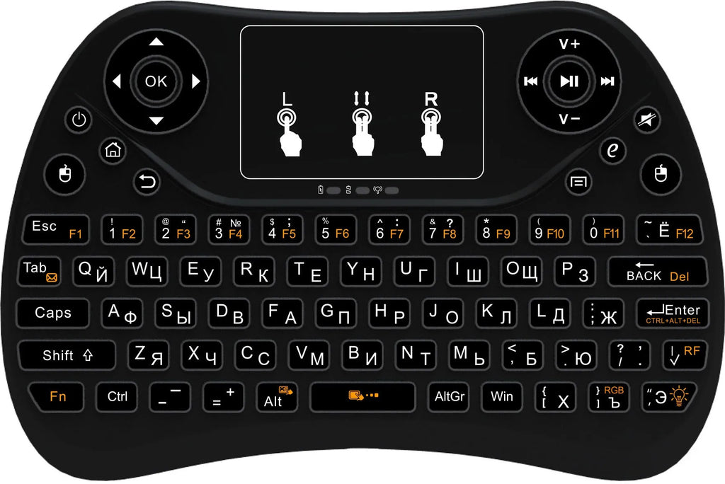 White mini wireless keyboard with colourful backlit keys and included flying squirrel mouse on a desk