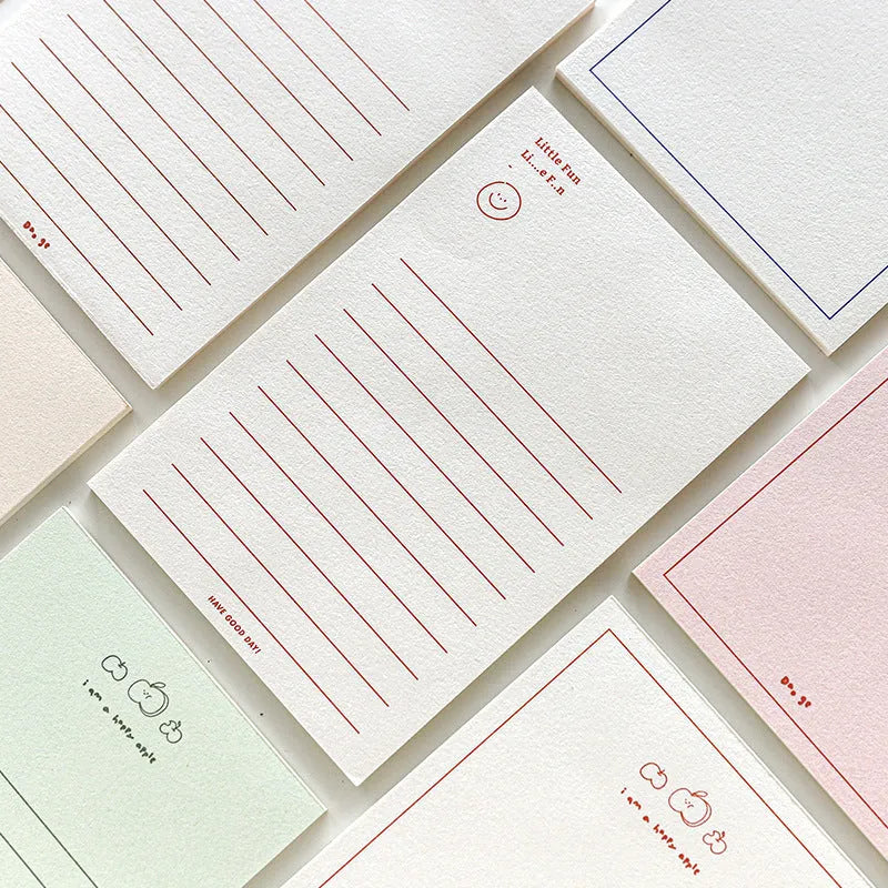 Memo pad notebook compatible with iPhone showing paper cover and writing paper interior