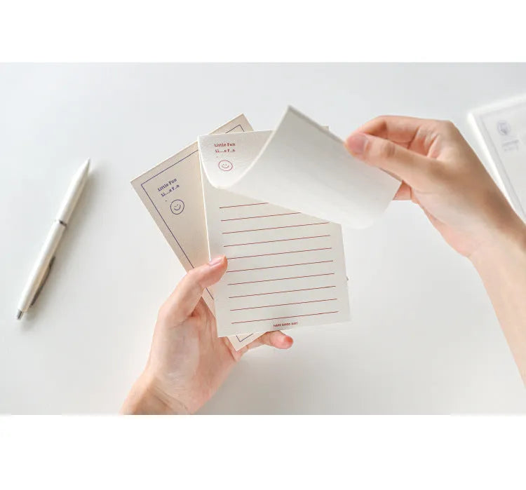 Memo pad notebook compatible with iPhone showing paper cover and writing paper interior