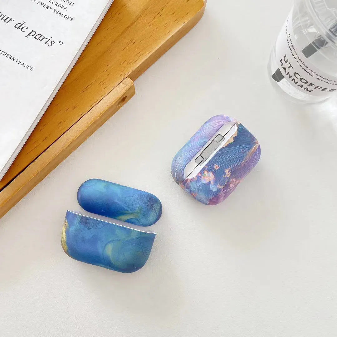 Pink and blue watercolour hard plastic protective sleeve for Apple AirPods 1, 2 and Pro charging case.