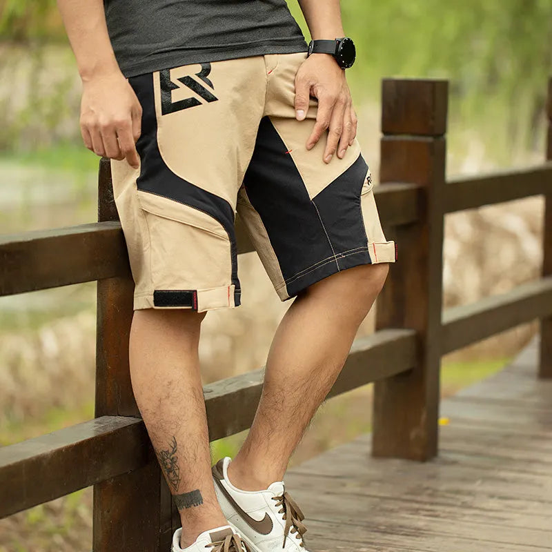 Mens double-layer cycling shorts in black with split design and sponge cushion