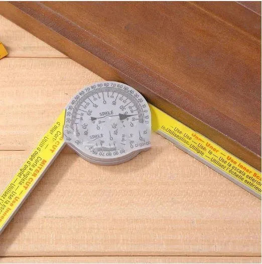 Yellow and white cross-border horizontal angle ruler with laser engraved scales for saw cutting.