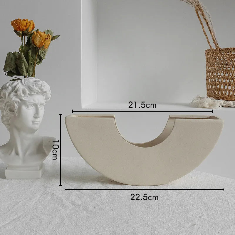 Matte ceramic dry flower vase with textured unglazed surface in Nordic design style