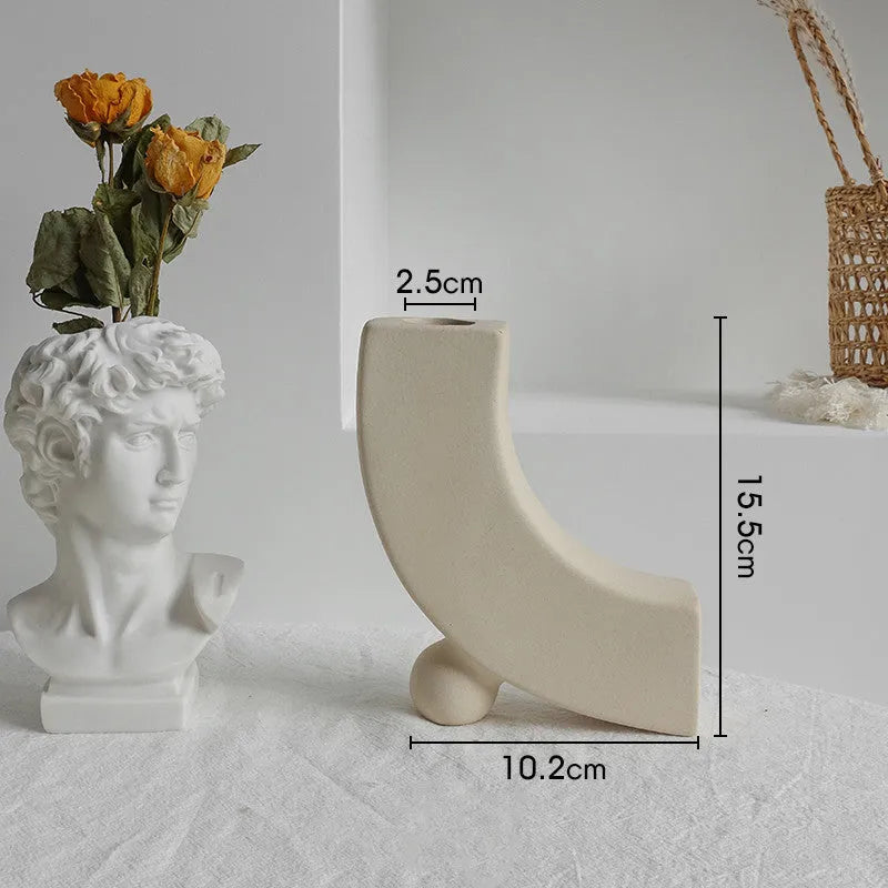 Matte ceramic dry flower vase with textured unglazed surface in Nordic design style