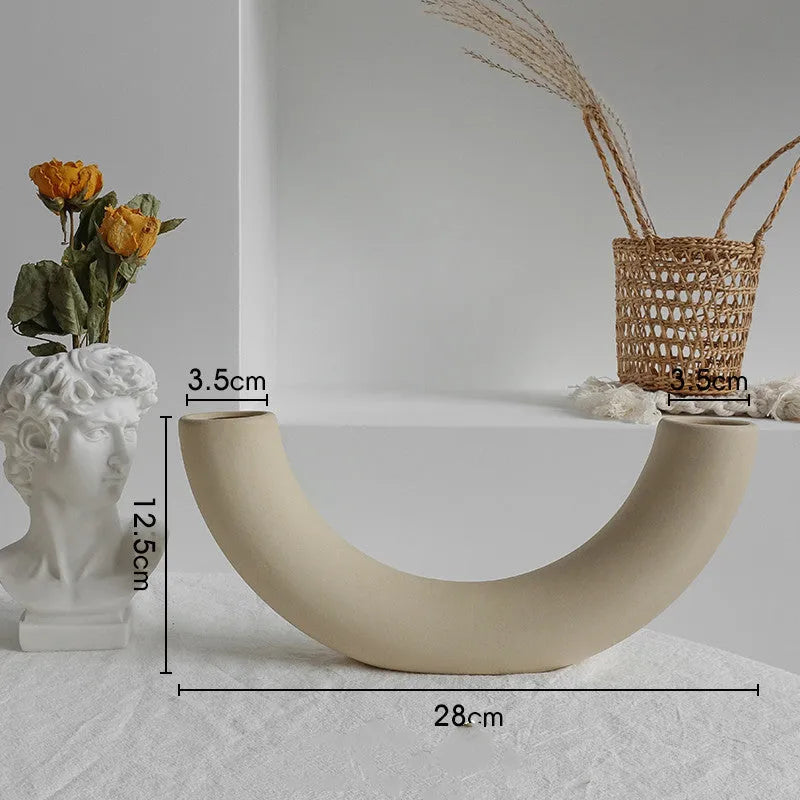 Matte ceramic dry flower vase with textured unglazed surface in Nordic design style