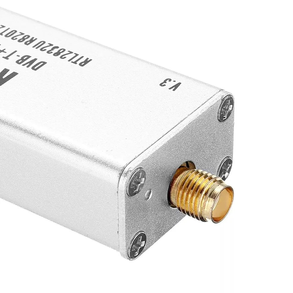 Black metal A300U all-band software-defined radio SDR receiver with golden SMA connector.