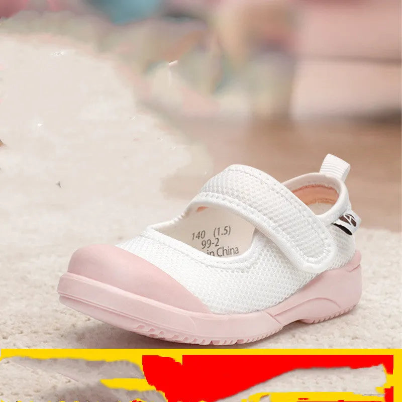 White children's cloth shoes with mesh uppers and velcro fastening for toddler boys and girls