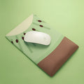 A kiwi-shaped mouse pad with a raised 20 mm thick wrist support section, shown in the colour as displayed.