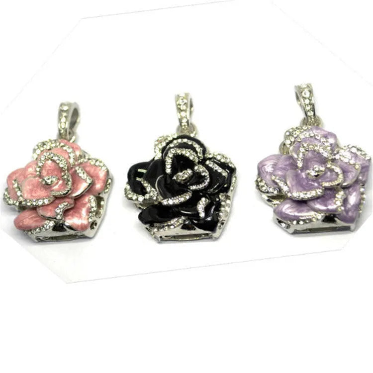 Diamond-studded metal rose flower USB drive with crystal design in blue, purple, and red colours