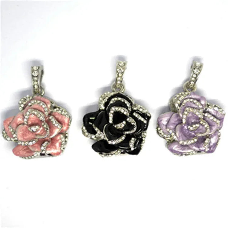 Diamond-studded metal rose flower USB drive with crystal design in blue, purple, and red colours