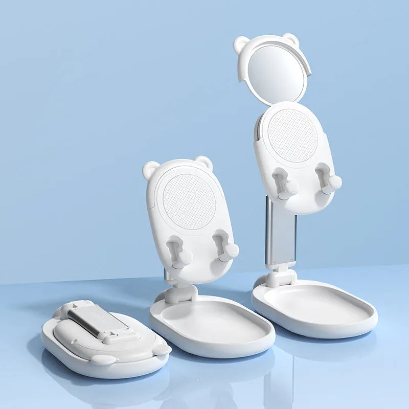 Blue adjustable desk phone and tablet stand with integrated mirror and non-slip silicone base.