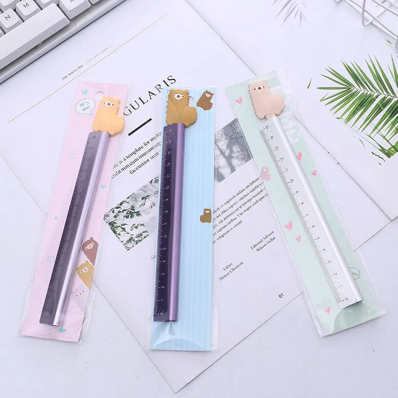 15 cm aluminium ruler with alpaca design showing straight edge and colourful pattern