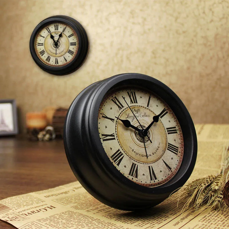 Round 6-inch retro-style desk alarm clock with silent sweep movement in a vintage colour on a wooden surface.