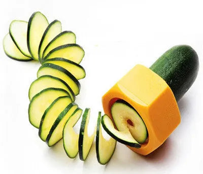Yellow and green ABS plastic spiral vegetable cutter for slicing cucumbers.