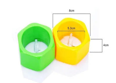 Yellow and green ABS plastic spiral vegetable cutter for slicing cucumbers.