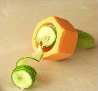 Yellow and green plastic spiral vegetable cutter on kitchen counter