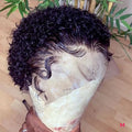 Black African small curly hair wig with fluffy explode style and long bangs on a mannequin head