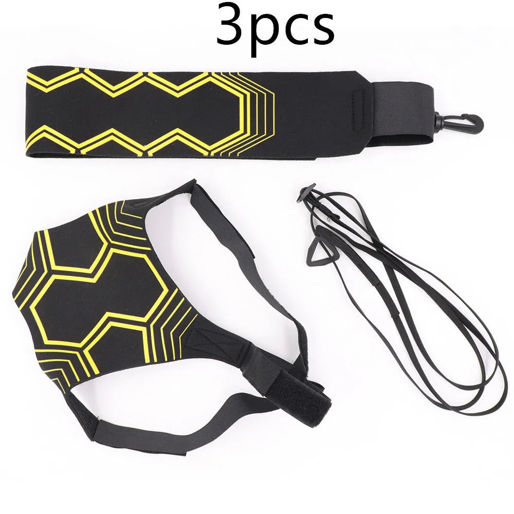 Black soccer training tether with adjustable waist belt and elastic Velcro strap on a green grass field
