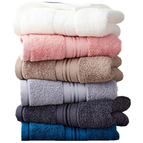 Three-piece cotton bath towel set in floral colours showing bath towel, hand towel and face cloth with optional logo printing