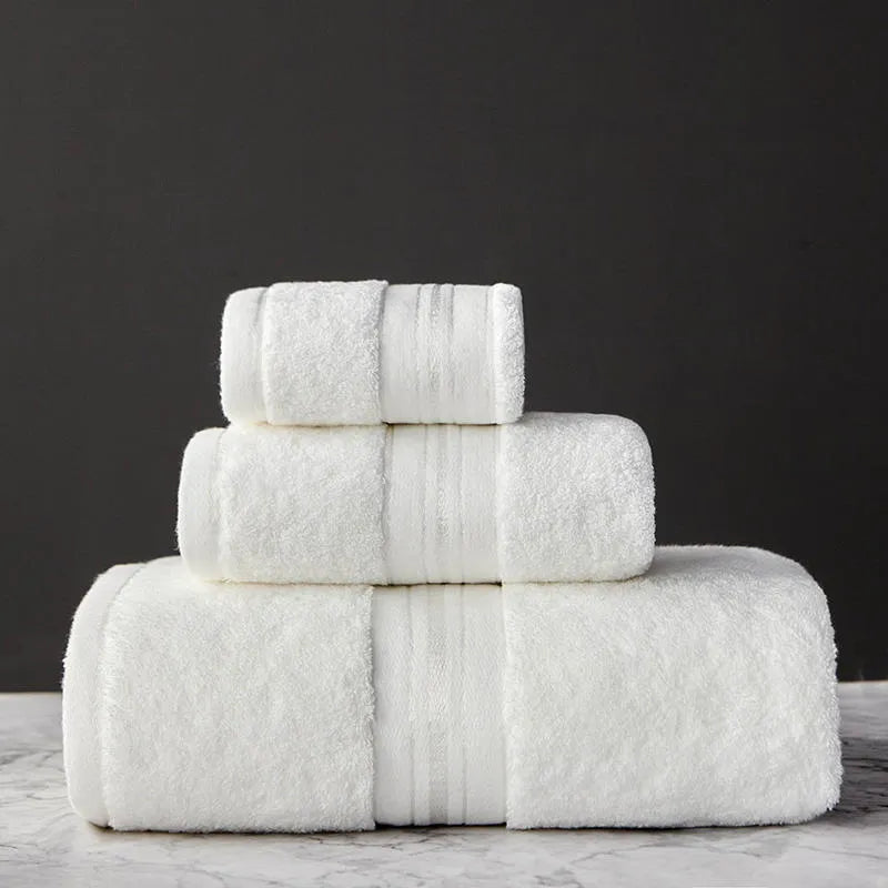 Three-piece cotton bath towel set in floral colours showing bath towel, hand towel and face cloth with optional logo printing