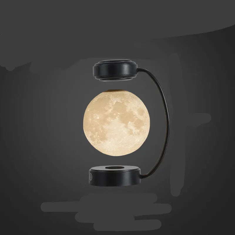 Magnetic levitation moon lamp floating above base with touch control and colour-changing illumination