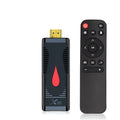 Smart Android TV set-top box dongle with remote control and HDMI cable on a white background.