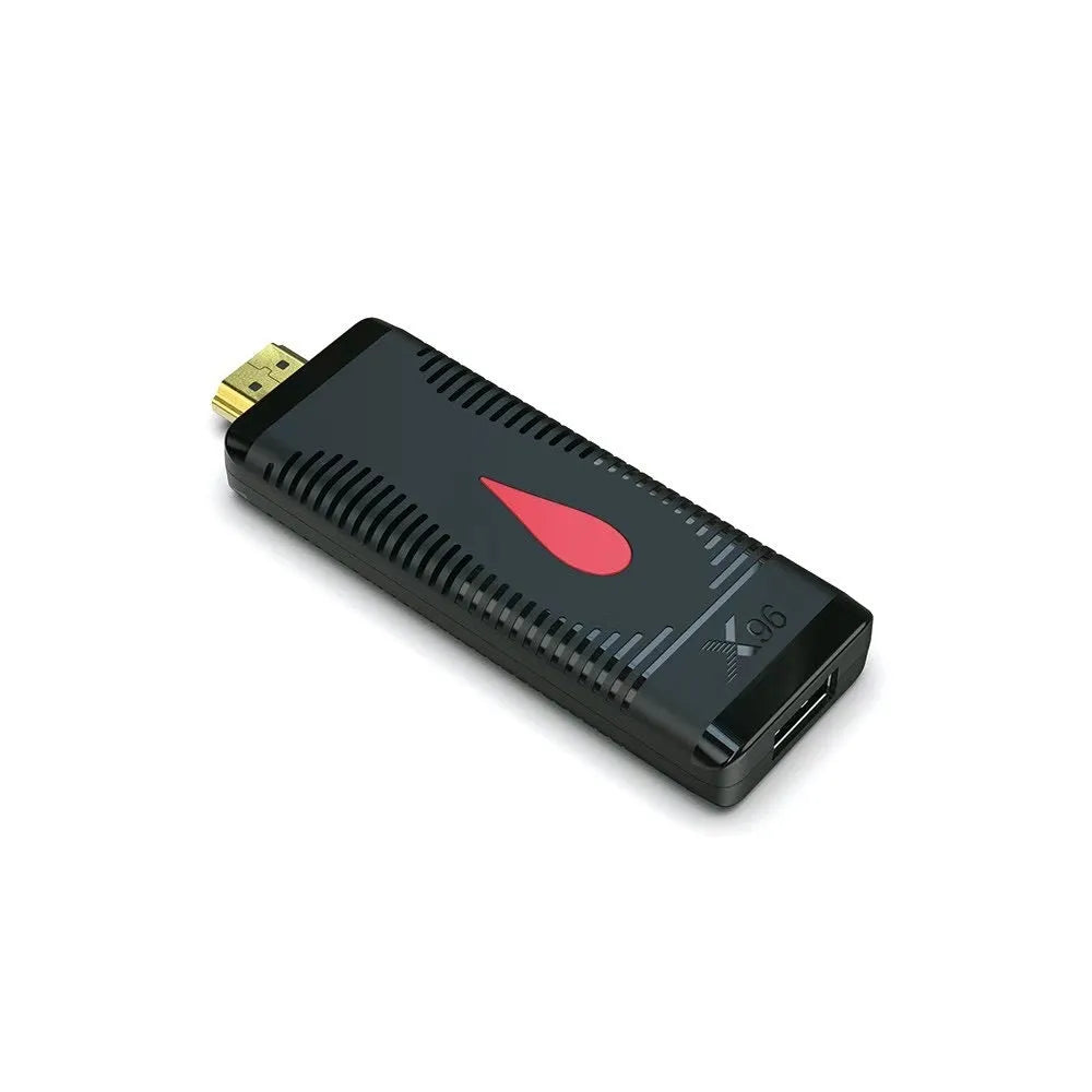 Smart Android TV set-top box dongle with remote control and HDMI cable on a white background.
