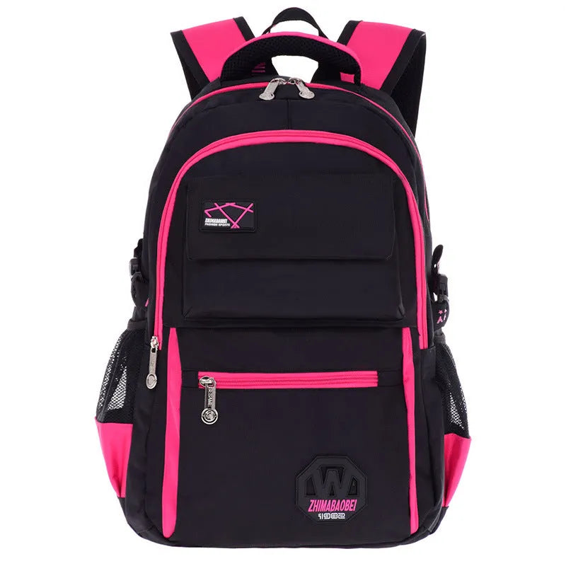 Waterproof nylon school backpack for grades 2-6 students in green colour with multiple compartments