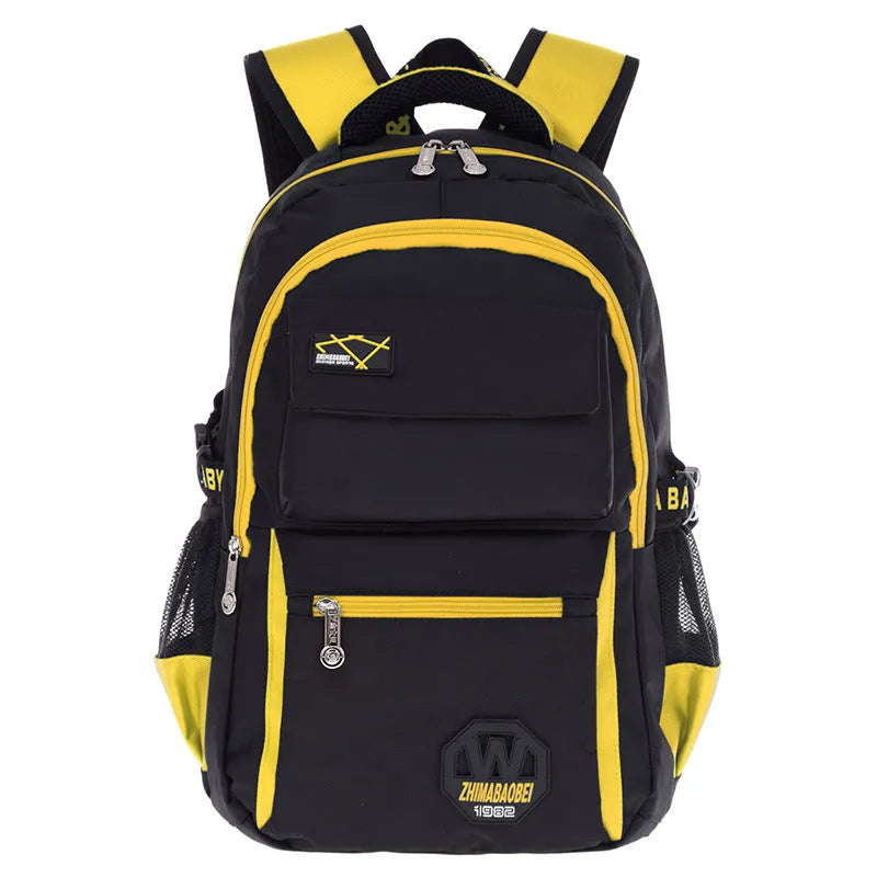 Waterproof nylon school backpack for grades 2-6 students in green colour with multiple compartments