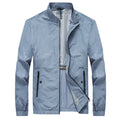 Kentino men's light blue polyester summer shirt with fashionable city styling on a hanger.