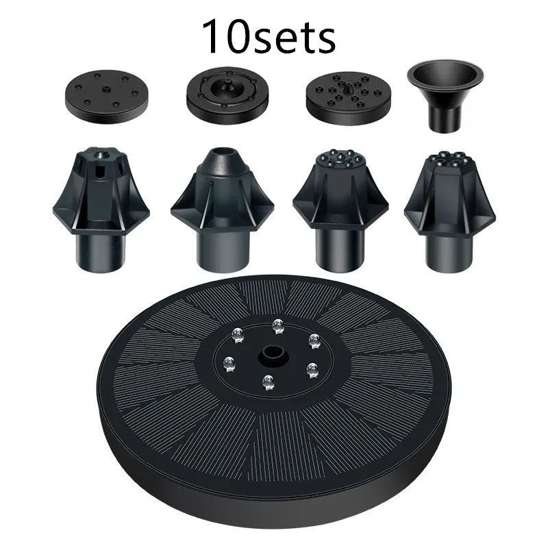 Black solar garden fountain pump with panel and four spray nozzles on grass