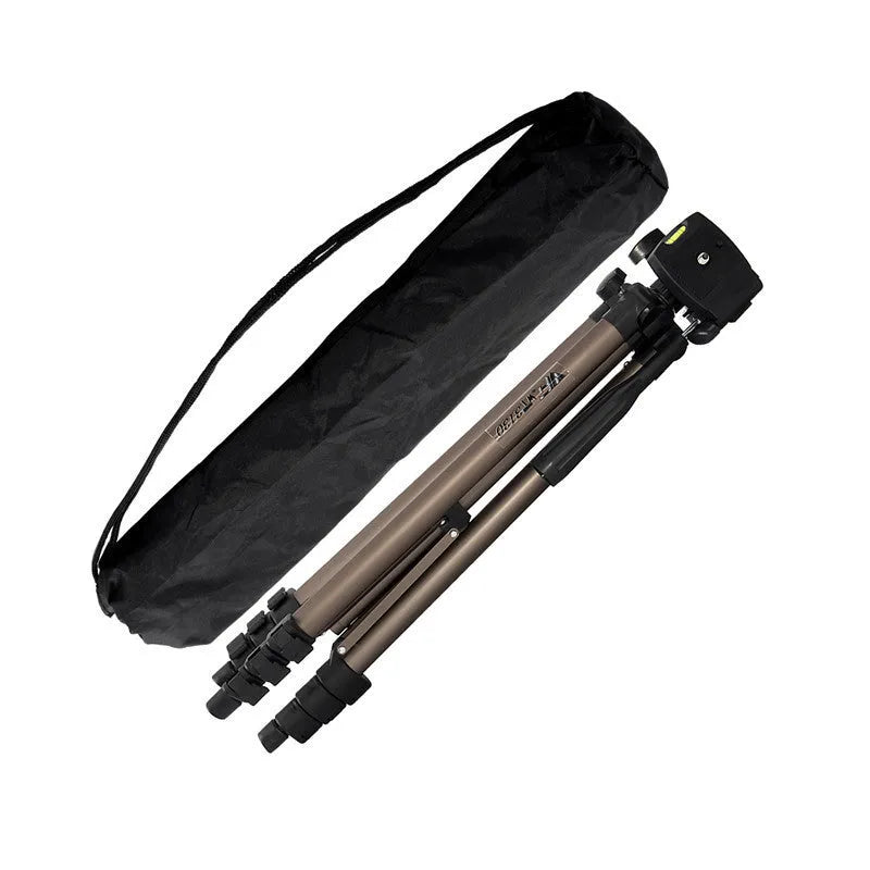 Aluminium camera tripod extended to 1.3 metres with mobile phone mounted and Bluetooth remote