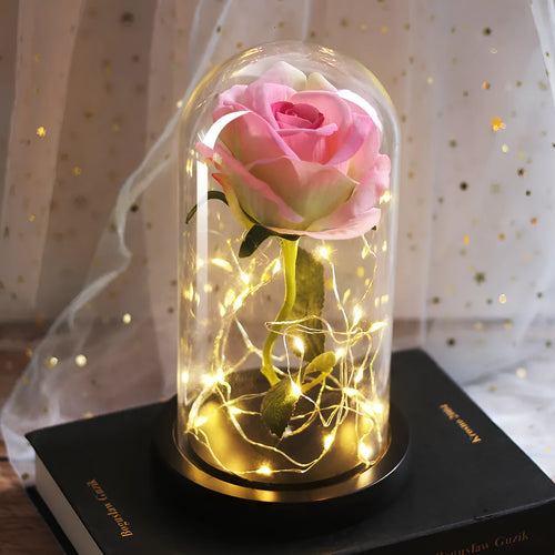 Artificial silk rose LED ornament with glass lampshade showing warm white lights, available in multiple colours.