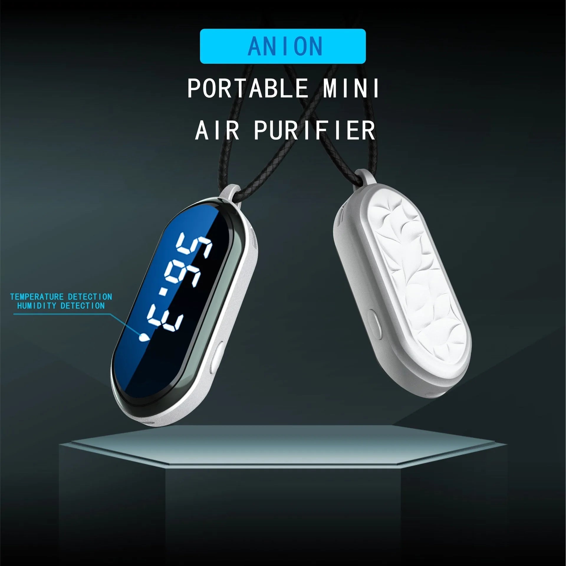 Portable negative ion air purifier in pearl white with metal lanyard and USB cable on a desk