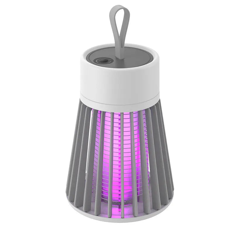 Electric-shock mosquito killer light purple light trap white plastic finish on tabletop indoor use