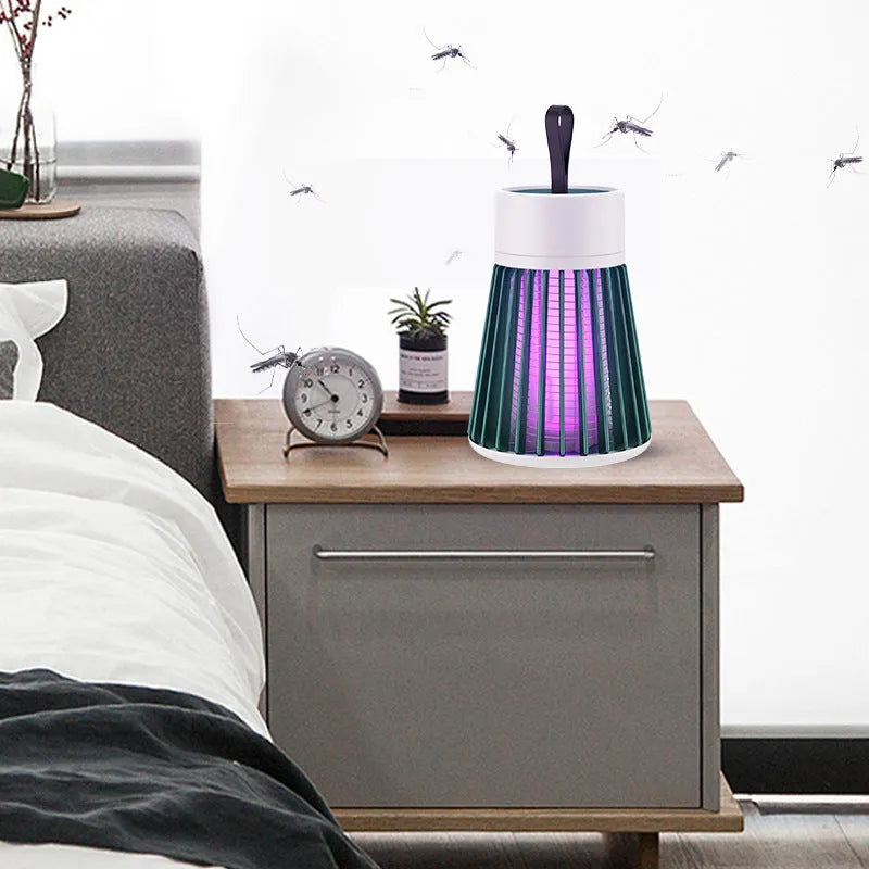 Electric-shock mosquito killer light purple light trap white plastic finish on tabletop indoor use